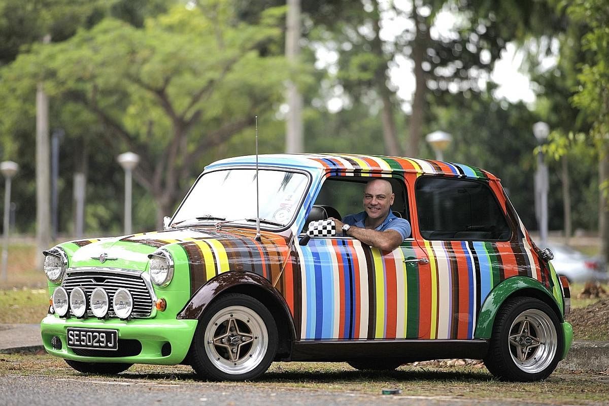Mr Chris Mead (above) with his colourful 1971 Austin Mini Cooper. Mr Steven Junior Teo's Minions-themed car (above). Mr Jeffrey Loy (left) got a Frozen wrap job on his car because his daughter Crystal is mad about the film. Mr Cash Chong (above, with