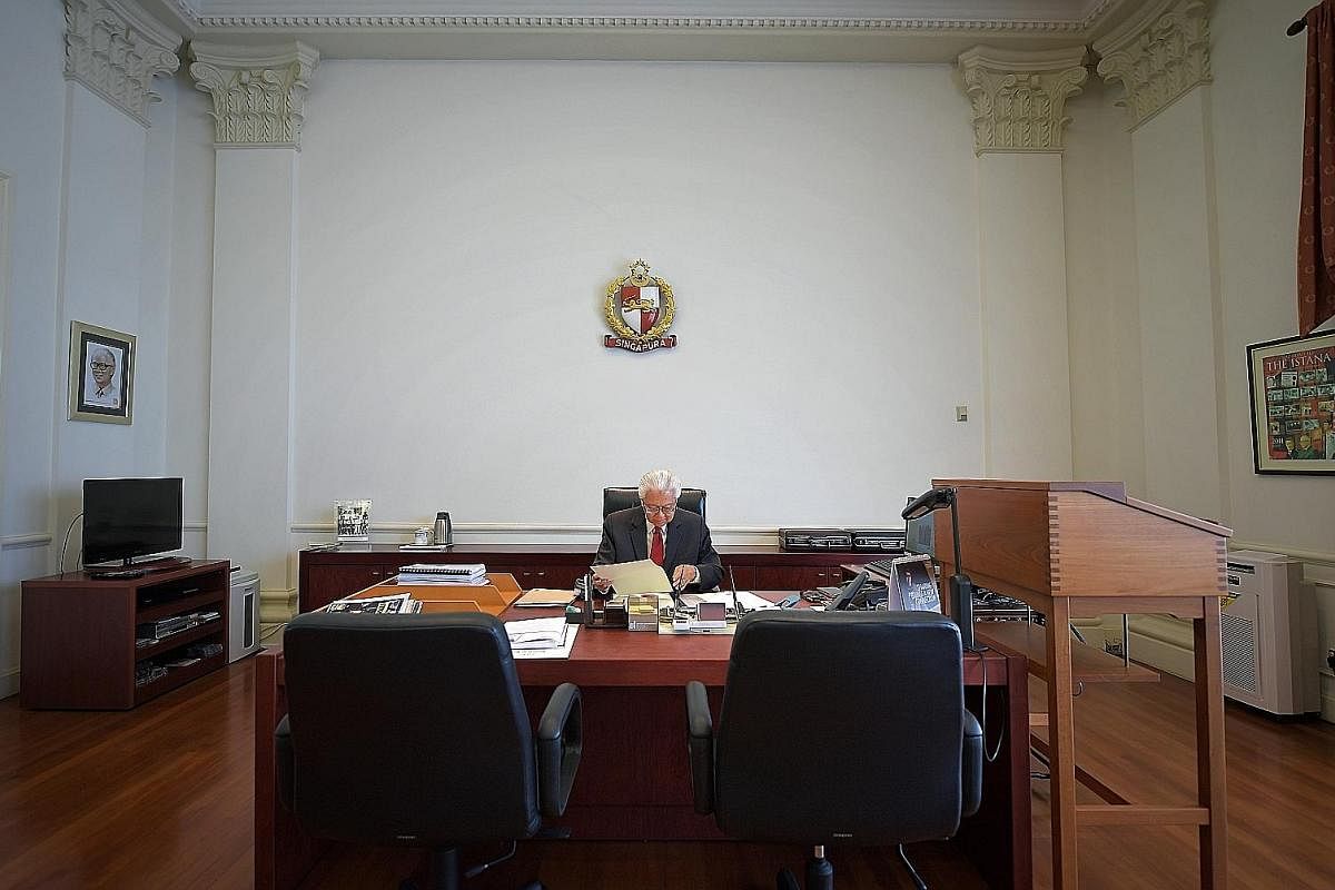 President Tony Tan Keng Yam at work in his office at the Istana. As the head of state, the President is the symbolic figure representing Singapore at ceremonies and on the international stage, a role that requires him to keep abreast of current devel