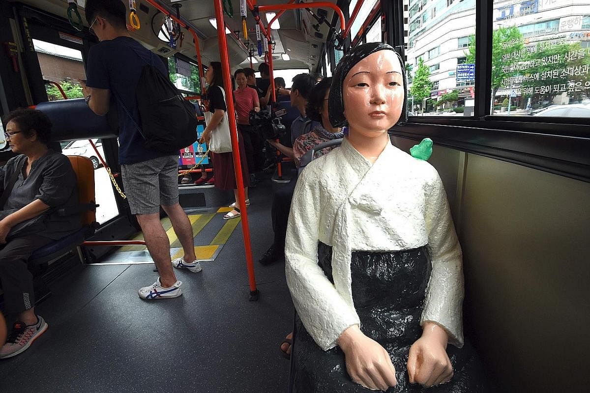  A statue symbolising South Korea's comfort women was placed on a bus in Seoul on Aug 14 as part of the lead-up to the country's National Liberation Day. The topic of comfort women is still sensitive there, with many believing that not enough has been don