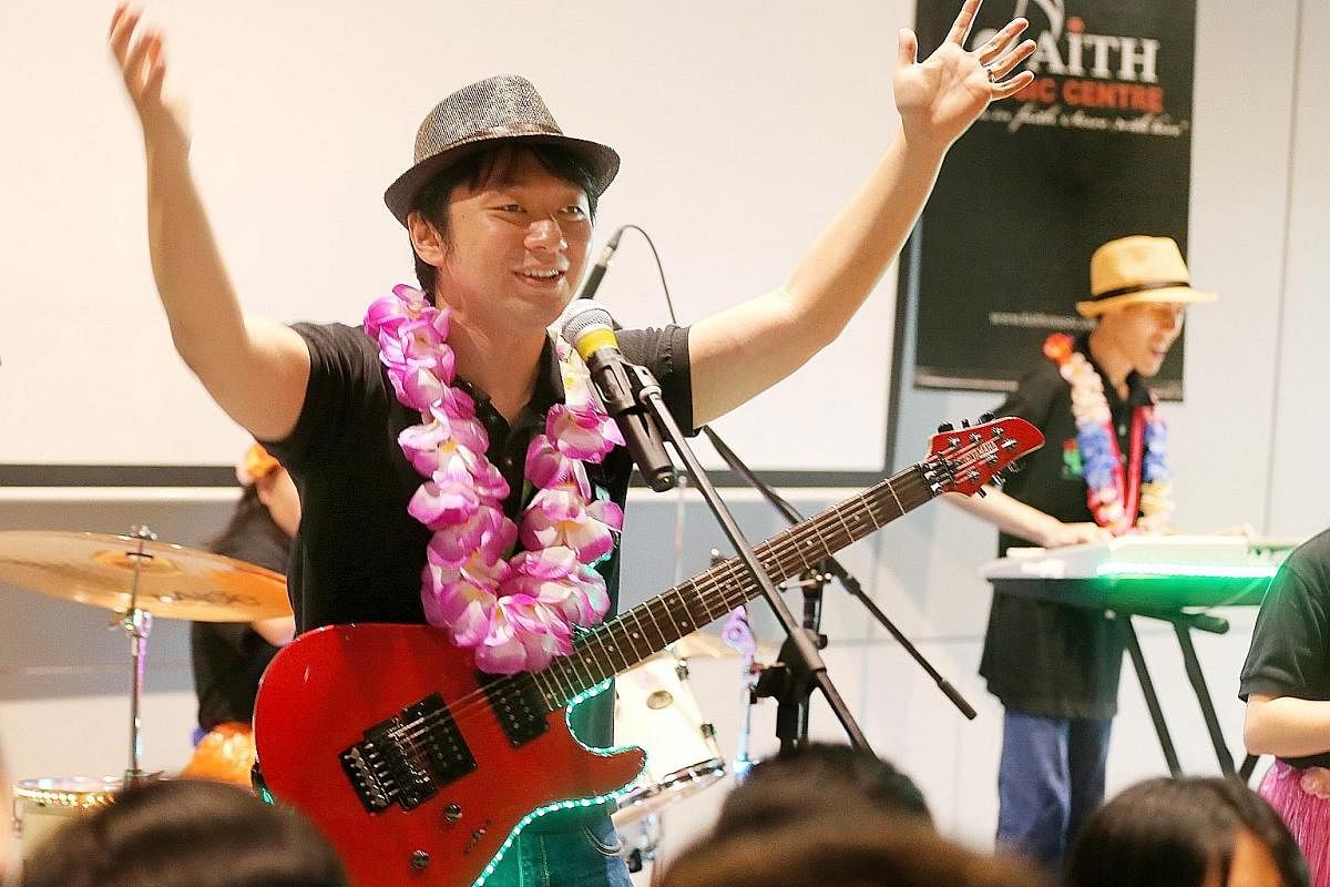 Guitarist and lead vocalist Ken Wong, 29, who has macular dystrophy, is part of Cactus Rose, a band whose musicians have disabilities. They held a concert at the Enabling Village in Lengkok Bahru last Friday.