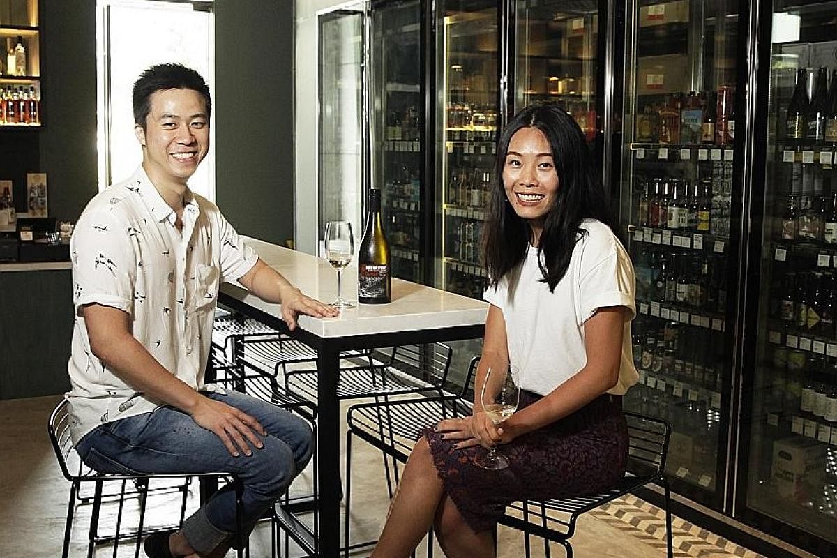 Montana's Ms Huang Shiying. Mr Kasster Soh and Ms Jasmin Wong of Temple Cellars. Mr Ian Lim, co-owner of RVLT, which stocks natural, organic and biodynamic wines. His phone shows a photo of co-owner Alvin Gho.