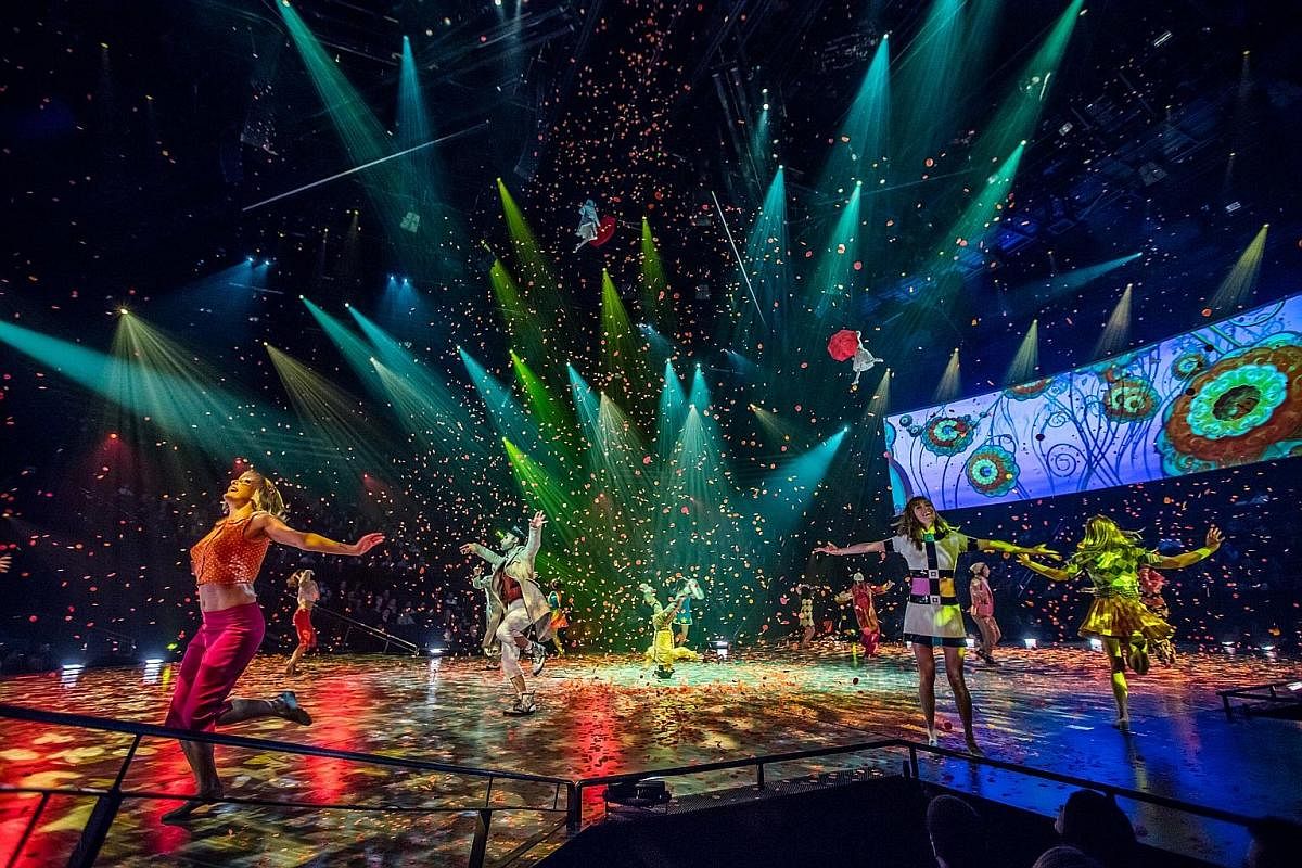 A synchronised swimming performance in the O show at the Bellagio Hotel & Casino in Las Vegas. Left, above: Performers dancing to the tune of The Beatles song Sgt. Pepper's Lonely Hearts Club Band, as confetti rains down, at The Beatles Love show at 