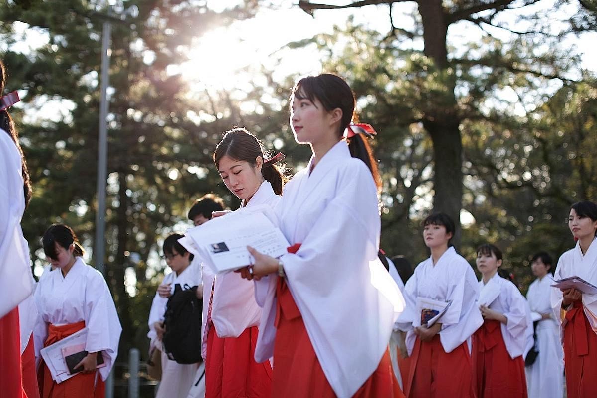 Being an Honestbee "bee" is popular among housewives, students, freelancers and young workers. And nearly 100 women (left) underwent training last December to be a part-time "miko" or Shinto priestess for Nishinomiya Shrine's New Year events. Left: A