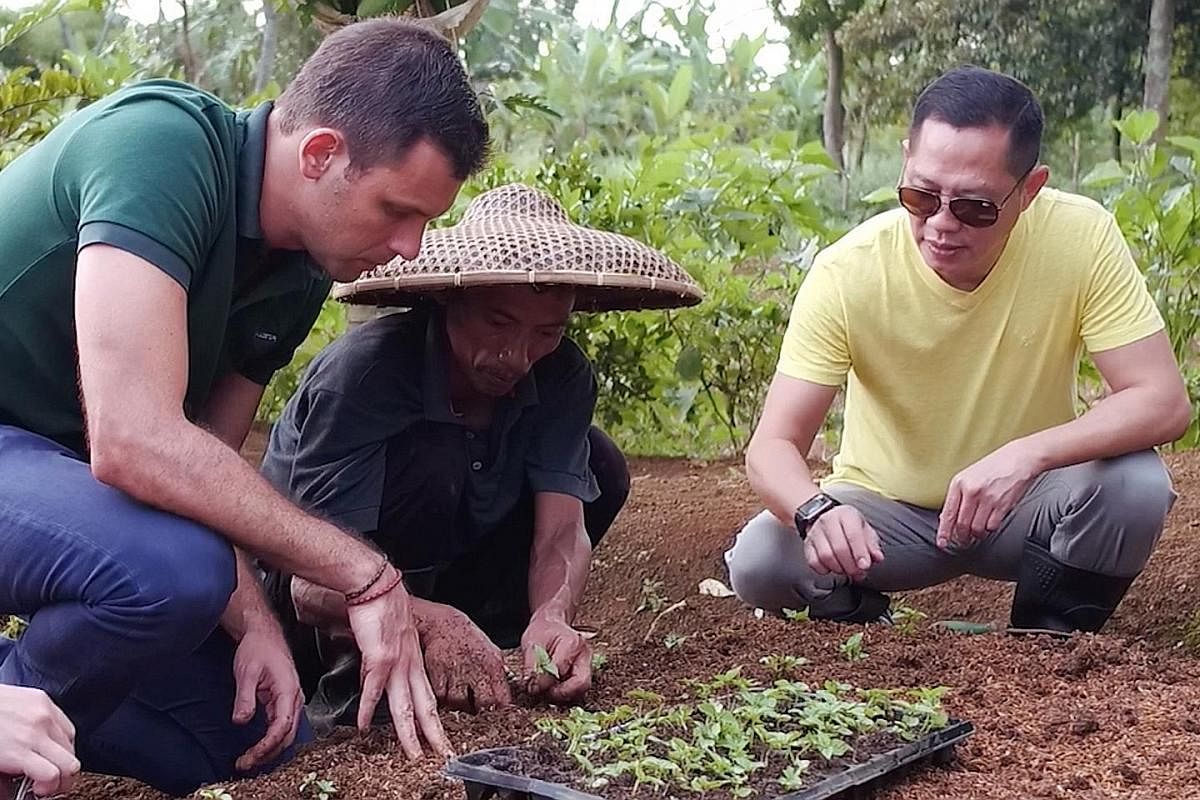 Mr Adrien Desbaillets with farmer Pak Angga (right) in Indonesia.