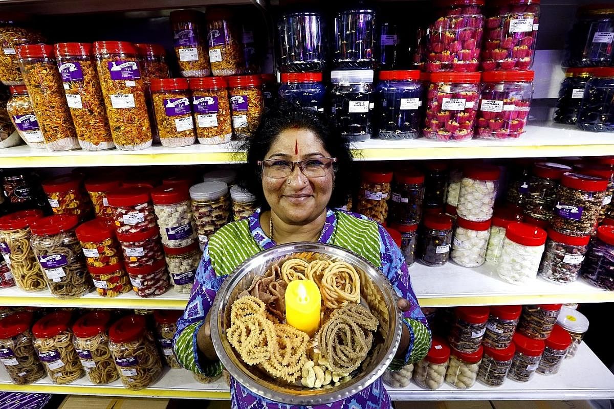 Mrs Shan Rajan, owner of Uncle’s Snacks, with murukku made of cashew, onions and ragi, finger millet cereal.