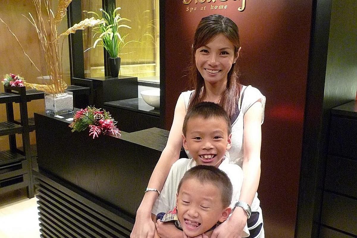 Ms Cheryl Gan as a toddler (above) in an undated photograph. Ms Gan with her two oldest children - Nicholas (centre), then eight, is now 15; while Nigel (bottom), then seven, is now 14.