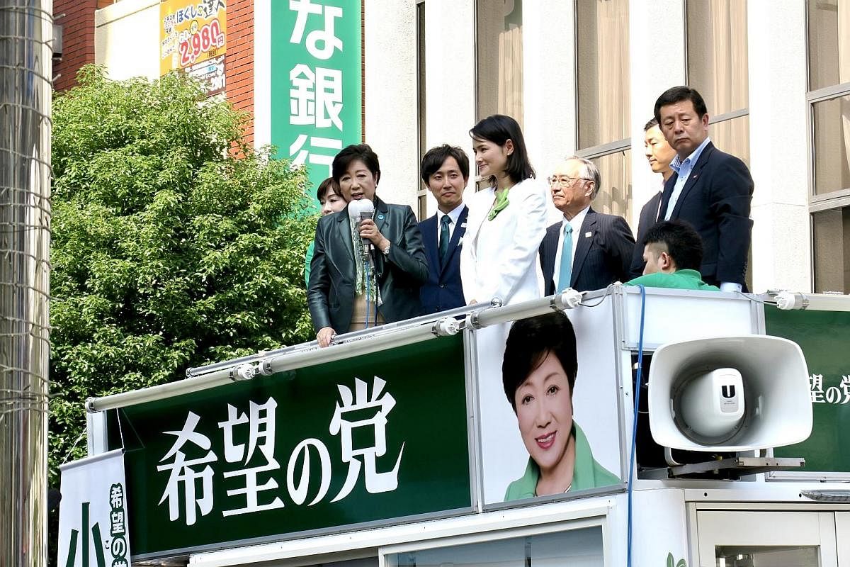 Tokyo Governor Yuriko Koike, who founded the Kibo no To (Party of Hope), speaking at a rally for party candidate Kaoru Matsuzawa, a lawyer, in the upmarket district of Azabujuban last week. Constitutional Democratic Party of Japan head Yukio Edano at