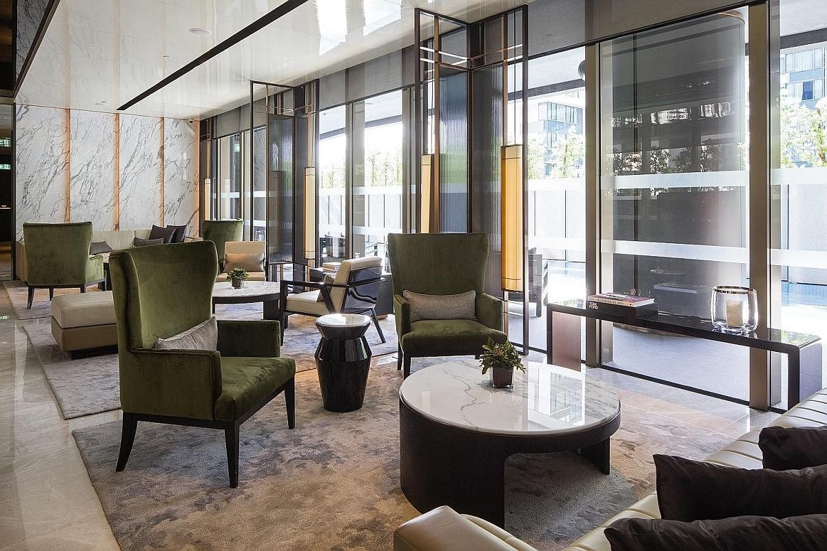 The reception area of the new InterContinental hotel at Robertson Quay overlooks the swimming pool.