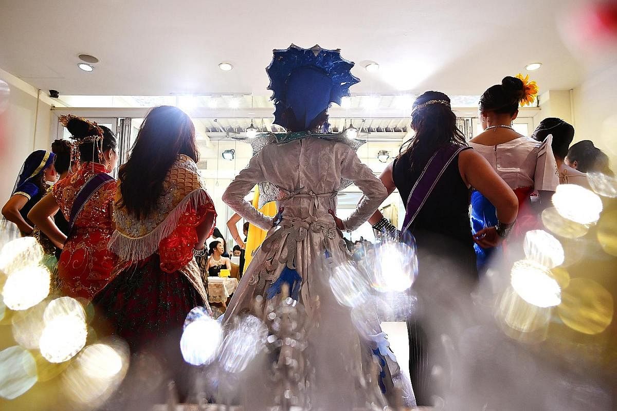Contestants all dressed up for a maid pageant held last Sunday. The number of these pageants has risen in recent years and The Sunday Times found that there is a contest almost every week. Maids here sometimes take part in the contests without their 