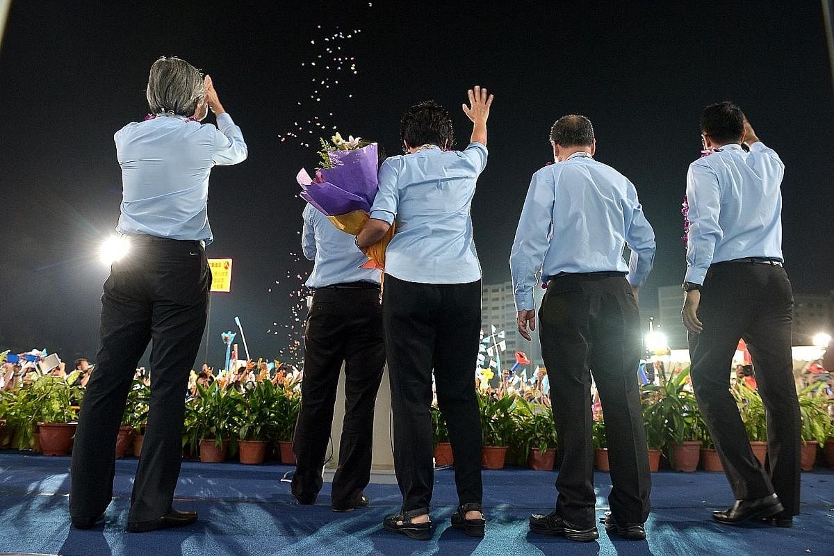 Workers' Party supporters at Hougang Stadium on May 7, 2011. They would learn later that the WP team led by Mr Low Thia Khiang and Ms Sylvia Lim had captured Aljunied GRC in the general election - a breakthrough for the opposition. Mr J. B. Jeyaratna