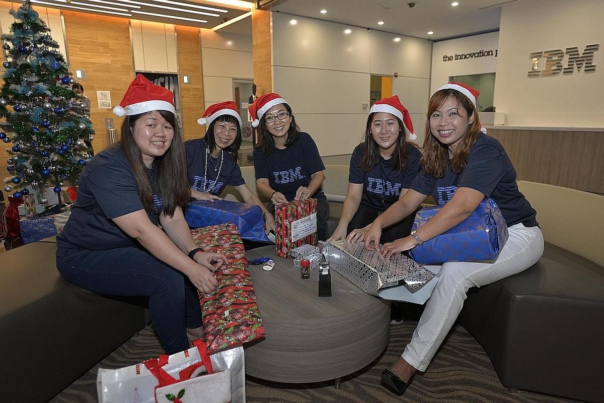 IBM Singapore staff (from far left) Hedy Lee, Lim Bee Lay, Fennie Foong, Lee Xin Yi and Elis Dawati are part of a group that is volunteering for Christmas this year.