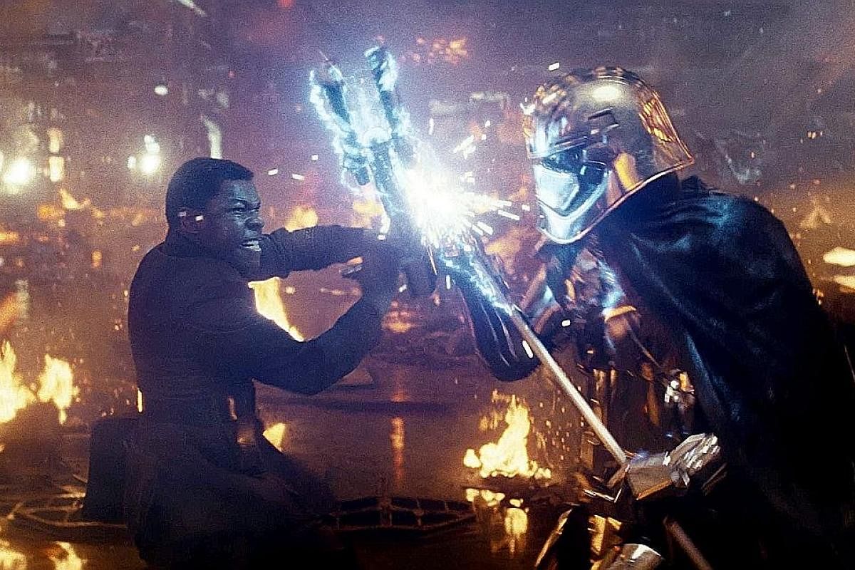 John Boyega (left) and Gwendoline Christie in Star Wars: The Last Jedi.