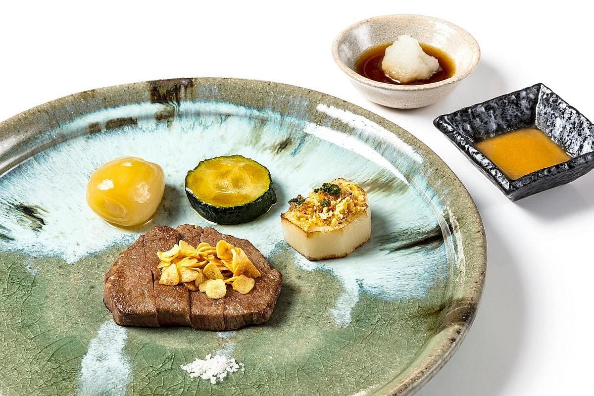 Teppan by Chef Yonemura's Japanese Wagyu Beef Fillet with Turnip, Zucchini and Simmered Deep-fried Shallots (above) and Live Prawn and Abalone Stuffed Tomato (left).