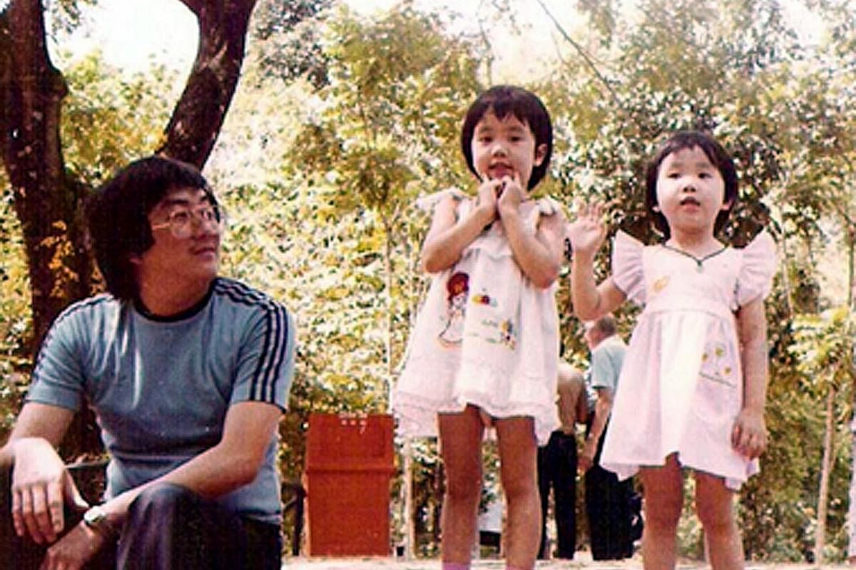 (Left) Ms Daphane Loke as a toddler with her father, Mr Cliff Loke, and elder sister, Alicia. (Right) She and her husband, Mr Ian Choo, on a holiday in Perth two years ago with their children, Logan and Lorraine. Ms Daphane Loke started Saybons as a 