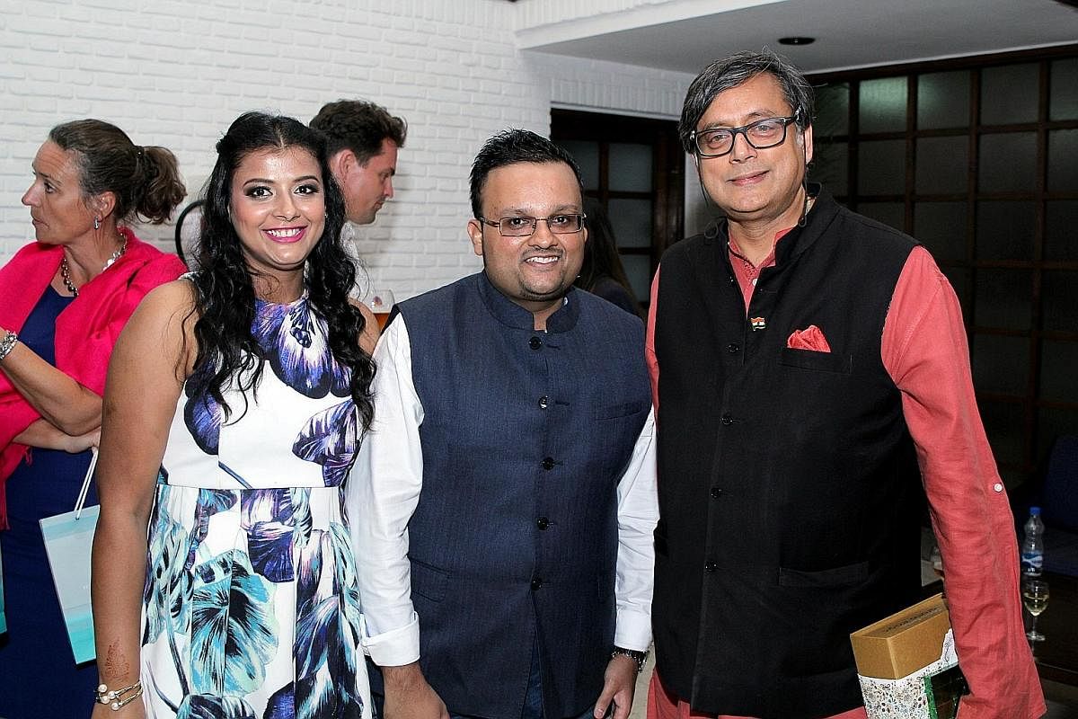 Delhi Book Lovers founders Meenakshi Goyal and Kunal Gupta with opposition politician Shashi Tharoor (far right), who wrote An Era Of Darkness: The British Empire In India. Far left: Indian author Parul Sharma reading excerpts from her book, Tuki's G