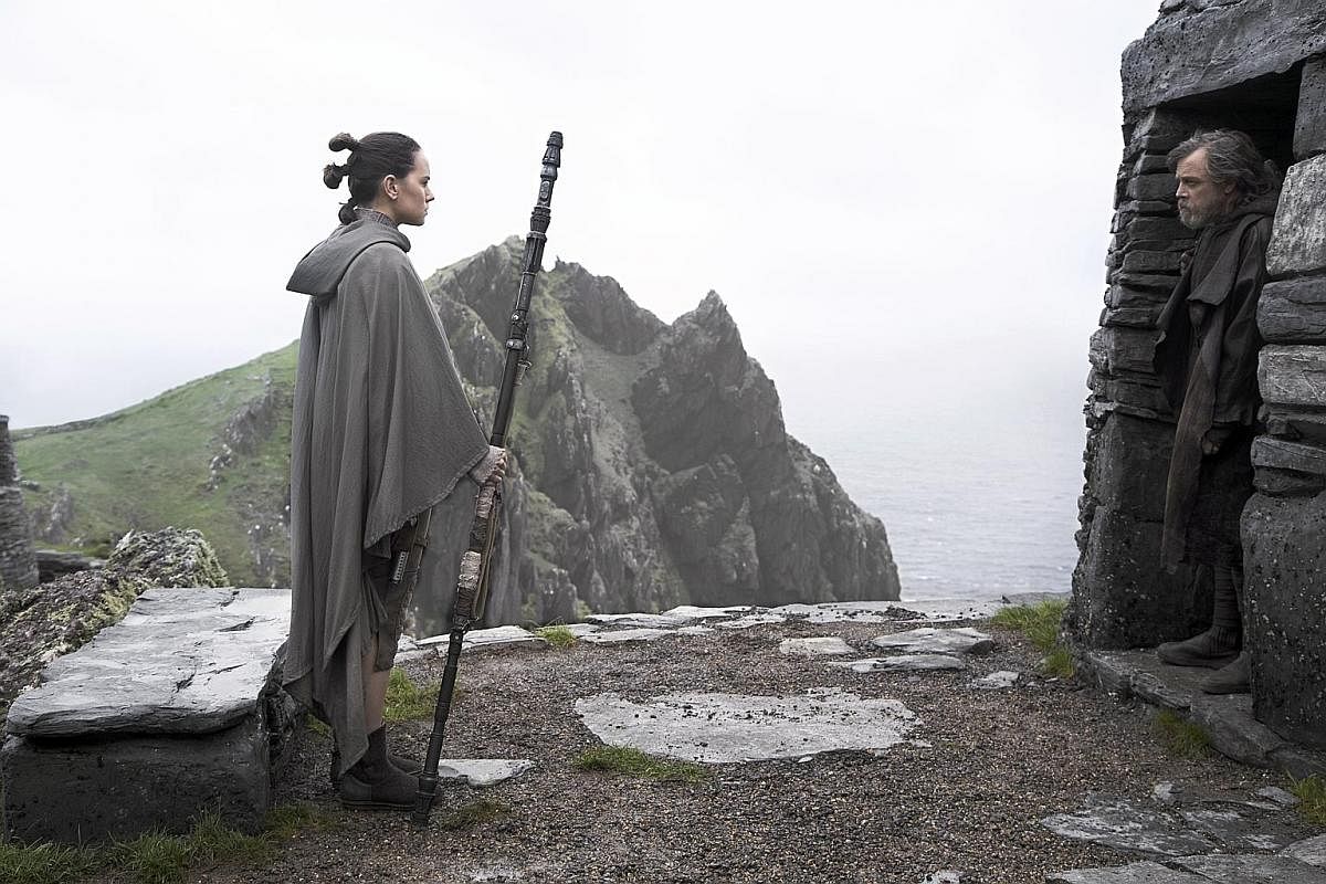 Actress Daisy Ridley and Mark Hamill playing Rey and Luke Skywalker in The Last Jedi.