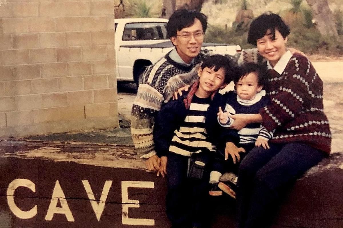 Siblings Silas (left) and Shamus Hwang on holiday with their parents, David Hwang and Brenice Ong, when they were kids.
