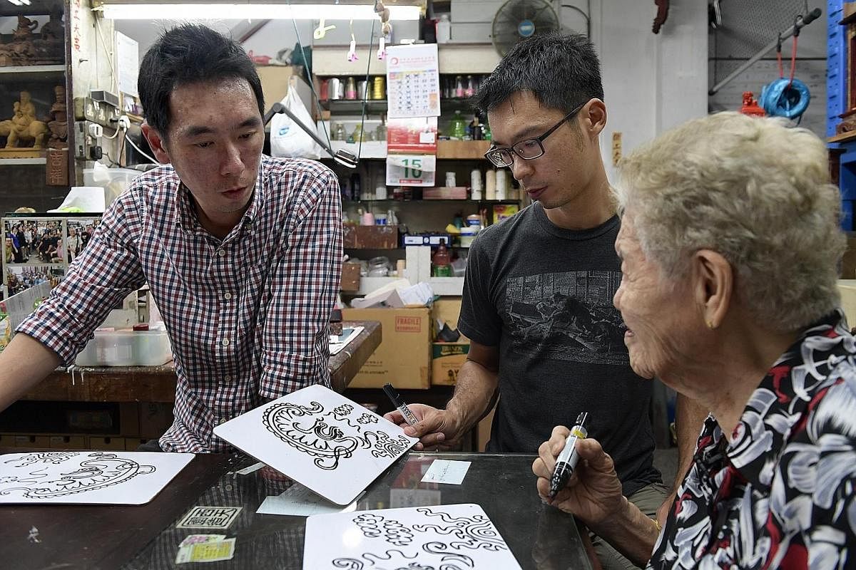 Once a week after work, Mr Ng Tze Chong (left), assistant manager, content curation at Discovery Networks Asia-Pacific, and brother Tze Yong, chief executive of local charity group Equal-Ark, get to learn more about the trade from their grandmother, 