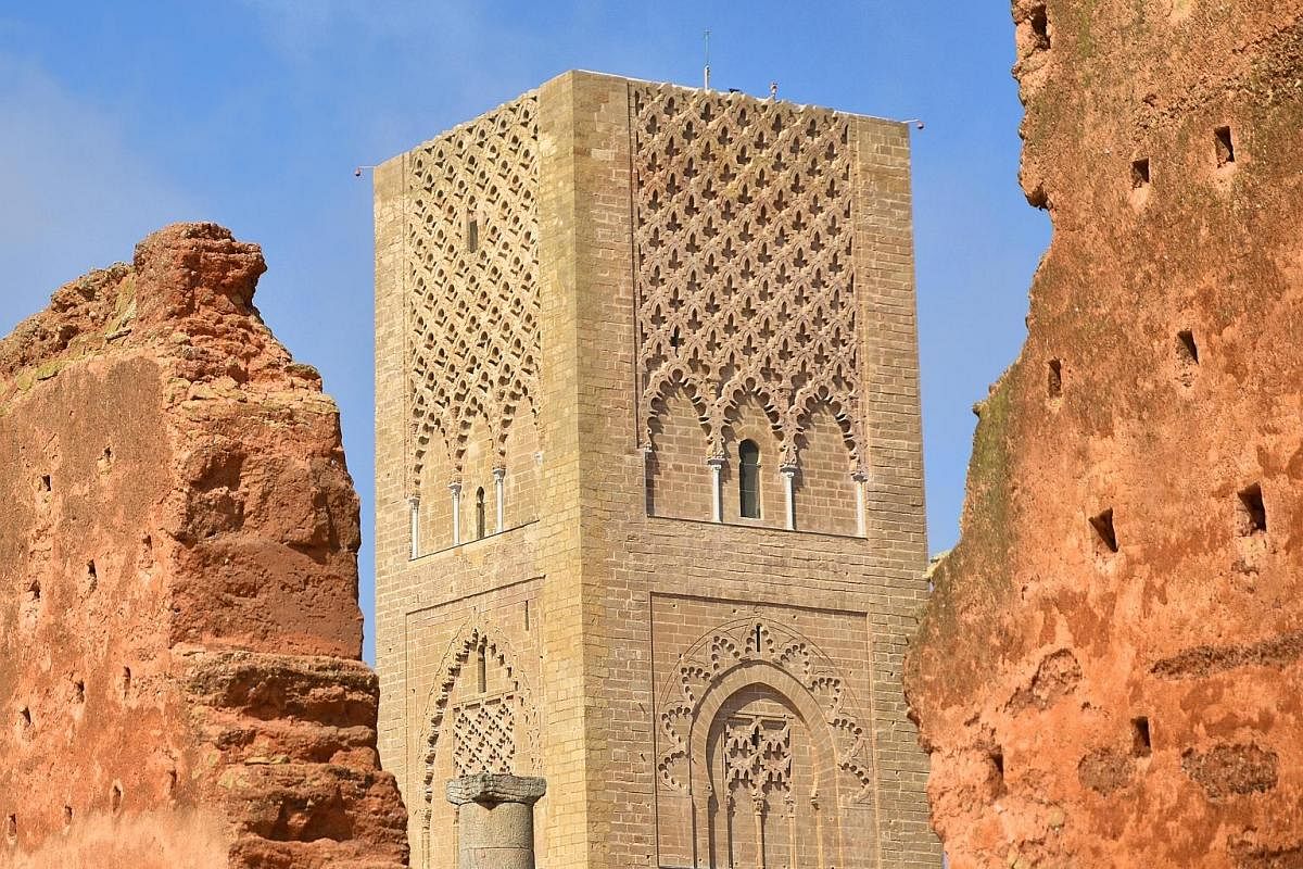 Hassan Tower peeks through the remains of a crumbling wall. Chellah is a remarkable cluster of architectural remains, with the site first inhabited more than 2,000 years ago. The Mausoleum of Mohammed V (left) is lavishly decorated. The Kasbah les Ou