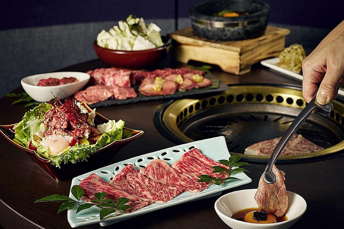 The Gyu Bar serves Omakase Beef Platter (above), which comprises a 300g selection of cuts, and Buta Don (below), rice topped with grilled pork neck and pork belly.