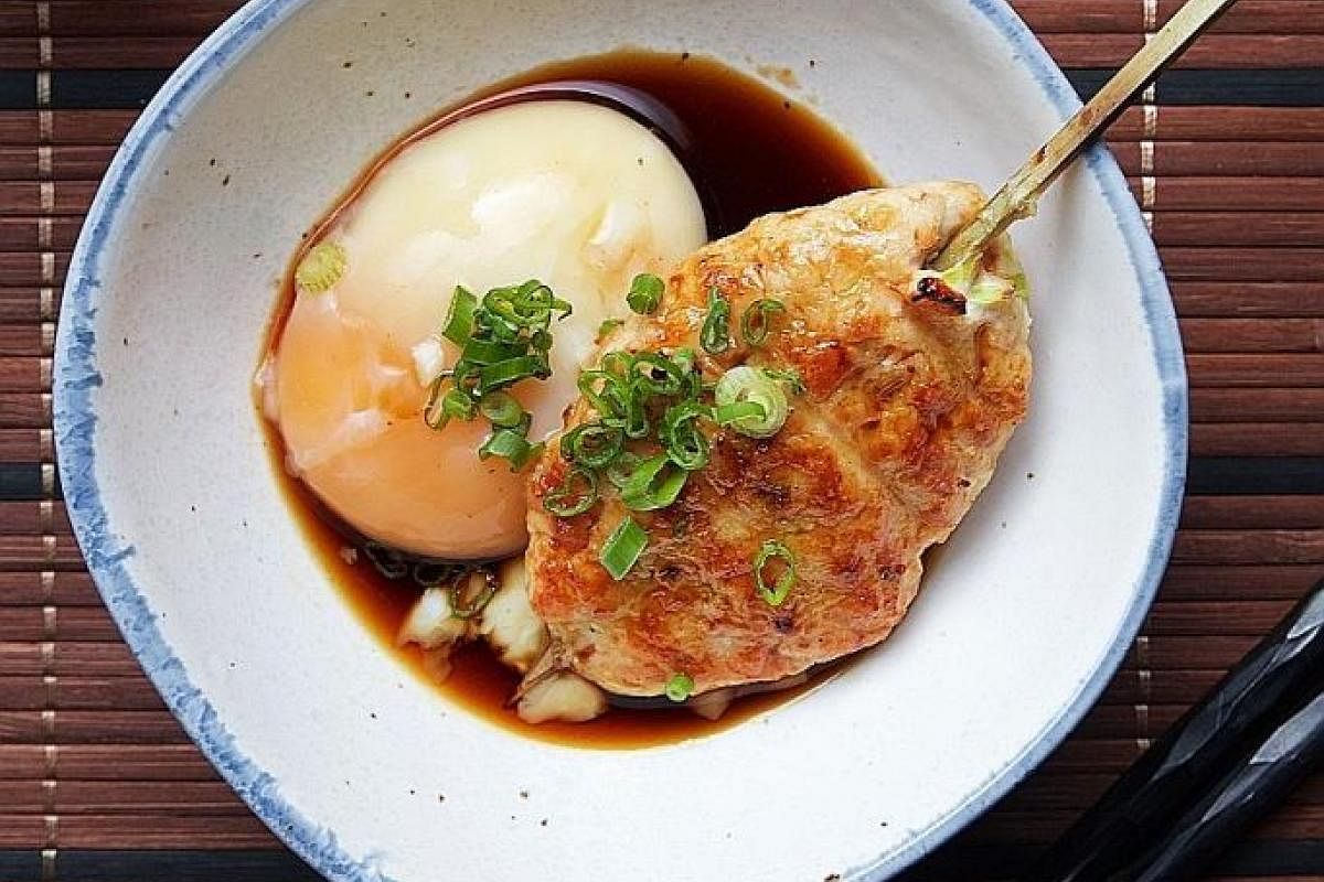 The Tsukune or chicken meatball comes as a big juicy patty and is served with a teriyaki dip with an onsen egg stirred in.