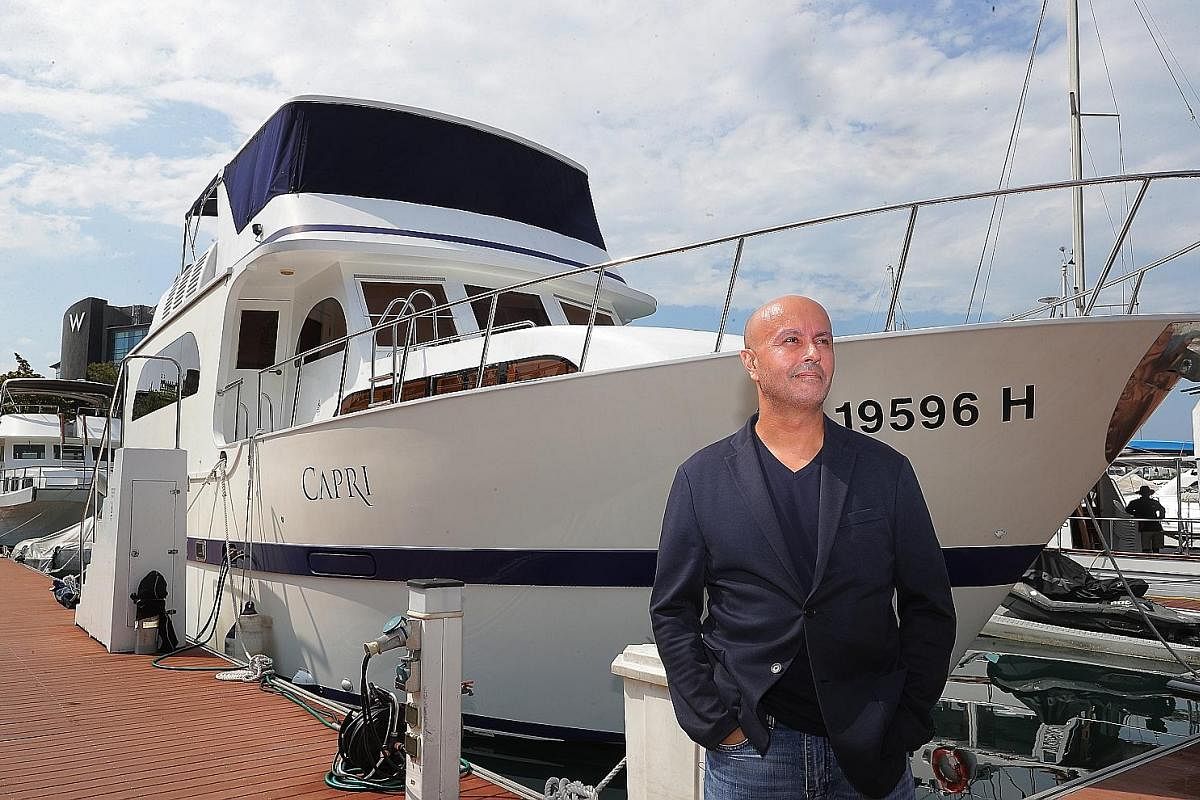 Mr Dany Bolduc called his 130 sq m yacht, Capri, home for seven years. The boat, berthed at a marina in Sentosa, had many of the amenities of a regular flat (far right). Staying on it was cheaper than renting an apartment of a similar size in a simil