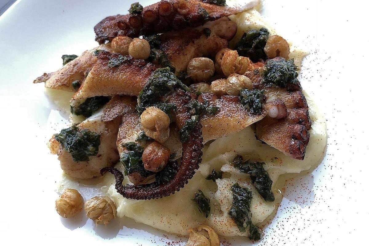 Order the Crispy Porchetta for sharing. The Charred Octopus has a firm texture, but is also tender enough to bite through without too much effort.