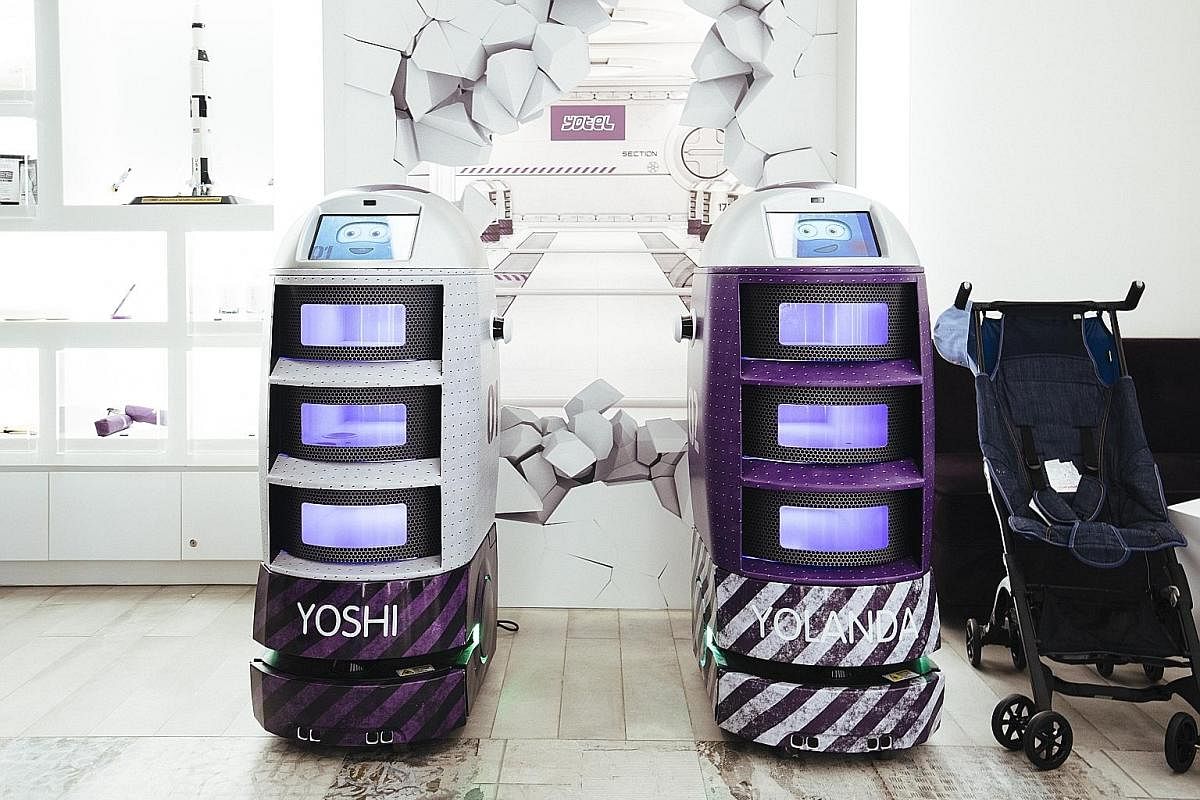 Guests can use machines to self-check-in. Robots Yoshi and Yolanda deliver water or room service to guests.