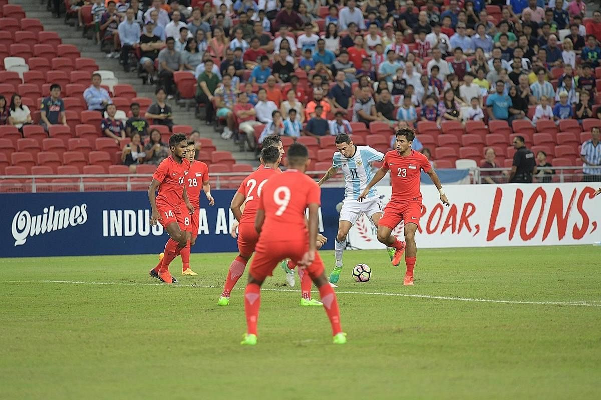 From top: Players and coaches generally felt that former Singapore coach Sundram's safety-first approach was more suited to league football, whereas goals and wins are needed in international qualification tournaments or knockout games. One of Sundra