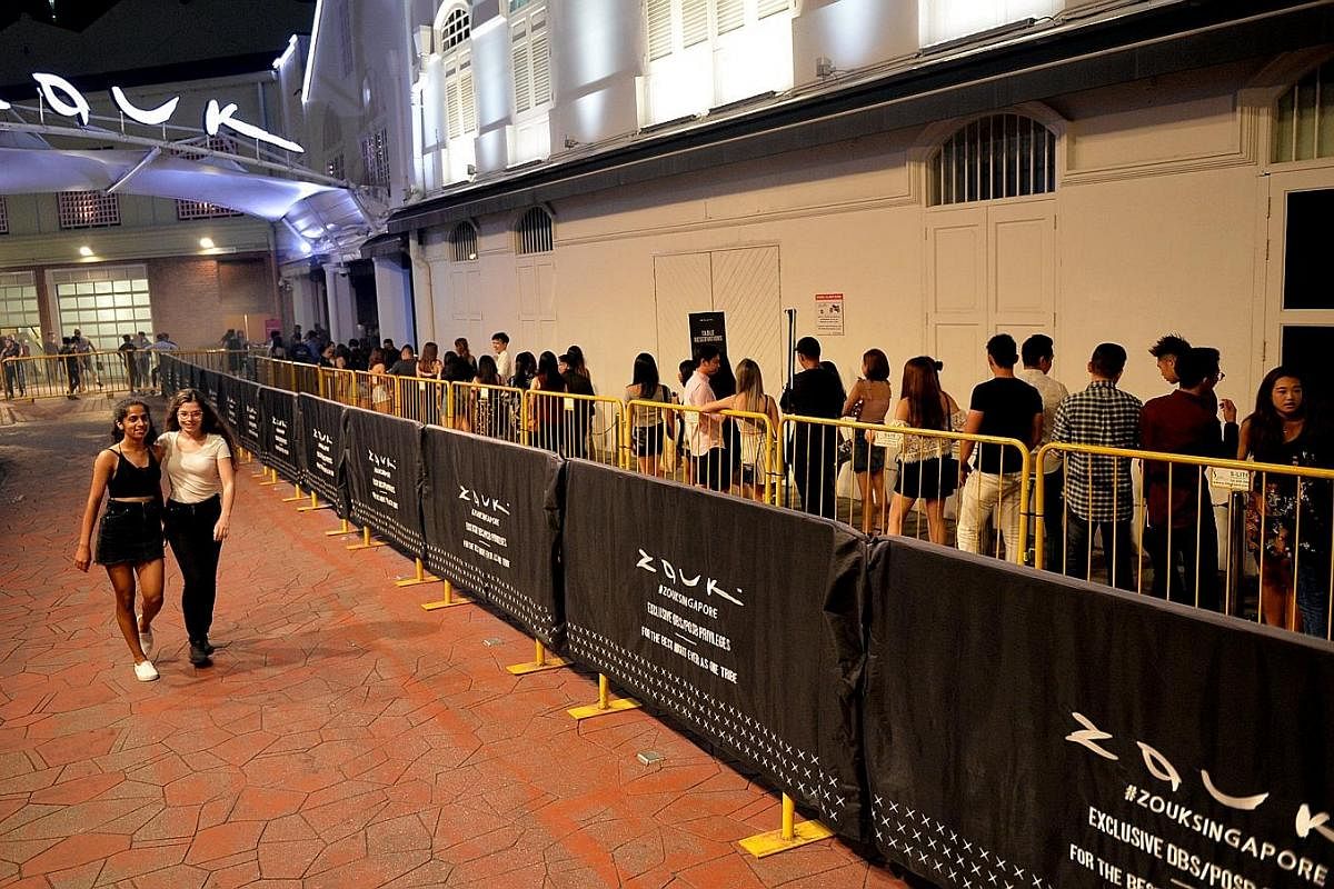 A champagne train at Avry, which has been open since December last year and has applied for the late licence. Mr Sanjay Rekhi, founder of Bollywood club Magic Carpet (left), says he has applied for a licence extension thrice. Long queues outside Zouk
