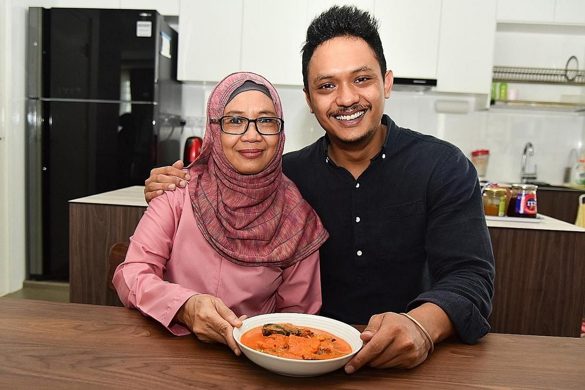 Ms Sohanah Mohamed Eusoff with her son Muhammad Sharizzat and his favourite dish, her sardines and pineapple in tangy and spicy coconut sauce.