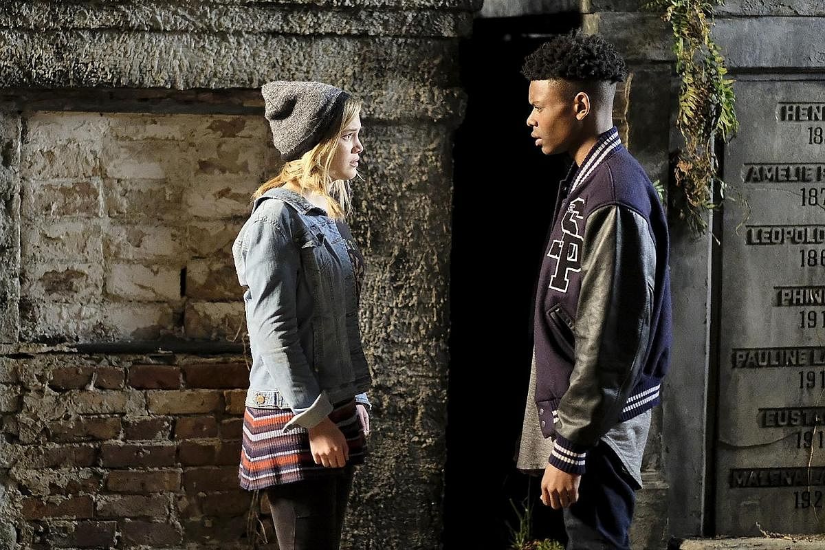 Olivia Holt and Aubrey Joseph (both left) play troubled teenagers with special abilities in Cloak & Dagger.