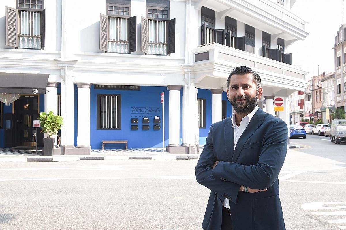 Mr Ashish Manchharam at his restored property - boutique hotel Ann Siang House, which opened in March and whose chic interiors combine modern furnishings with heritage architecture.