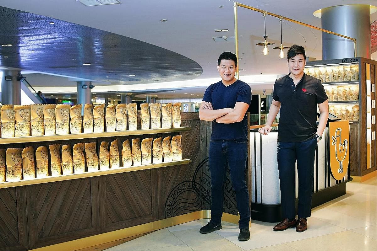 Mr Christopher Hwang (left) and Mr Jonathan Shen at their two-month-old store at Ion Orchard. They are working on new products with a new flavour. Mr Christopher Hwang (left) and Mr Jonathan Shen with their Most Promising Startup Award at the Emergin