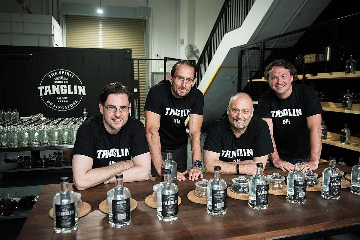 The team behind Singapore's first locally made gin, Tanglin Gin, (from left) Mr Andy Hodgson, Mr Chris Box, Mr Tim Whitefield and Mr Charlie van Eeden at their distillery at Mandai Foodlink.
