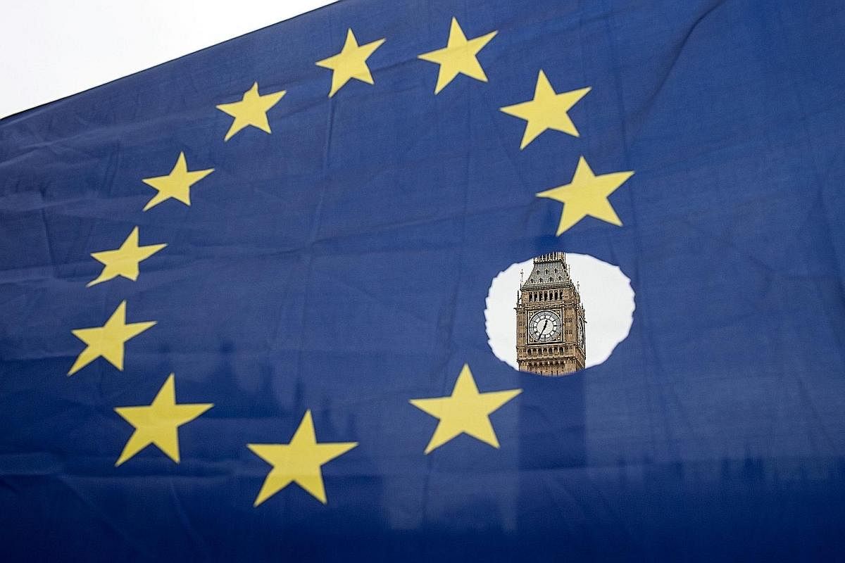 The European Union flag with one of the stars symbolically cut out. It is two years since Britons voted to break up with the EU and the country remains deeply divided over the best exit strategy, and whether it should reverse course. Tens of thousand