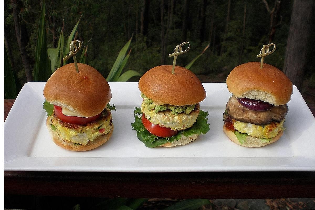 Spicy chicken sliders with (from left) cheese, tomato, sweet chilli sauce and coriander; mashed avocado, tomato and lettuce; and red onion, sauteed mushroom, chutney and lettuce.