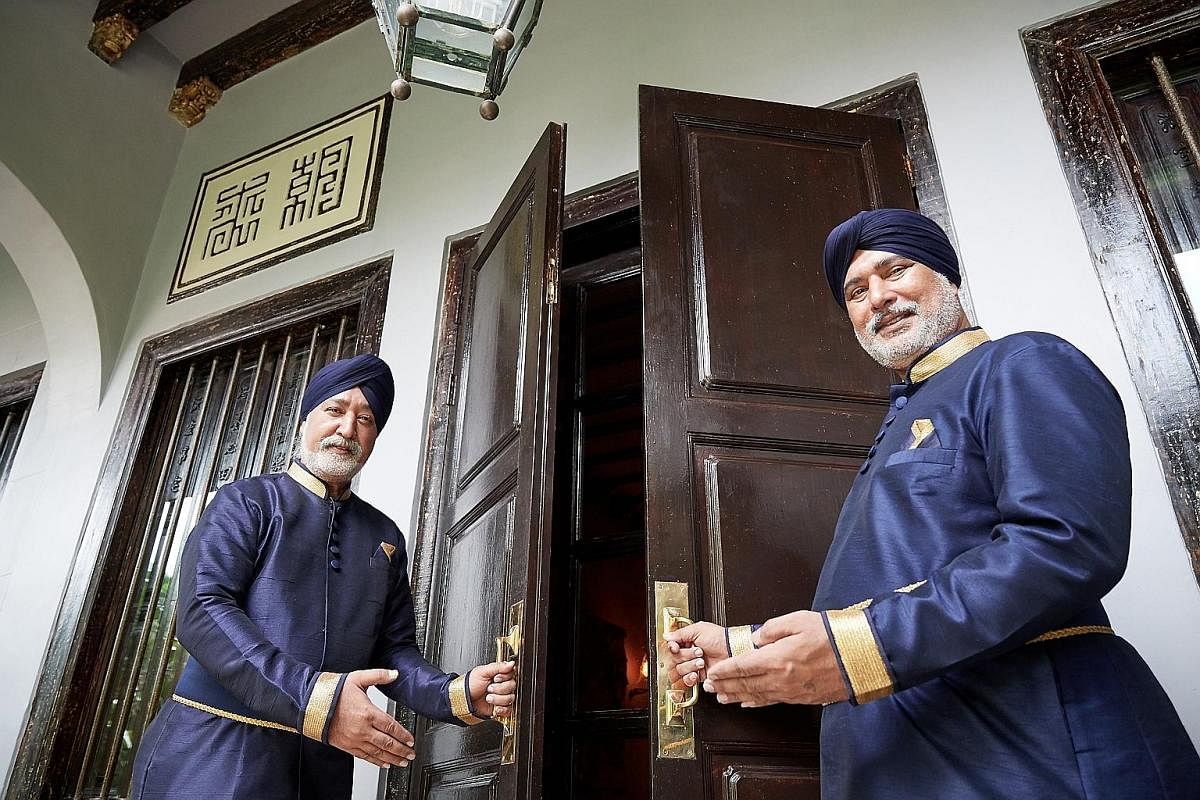 Brothers Swaran Singh (left) and Sarjit Singh were doormen at Raffles Hotel for 26 years.