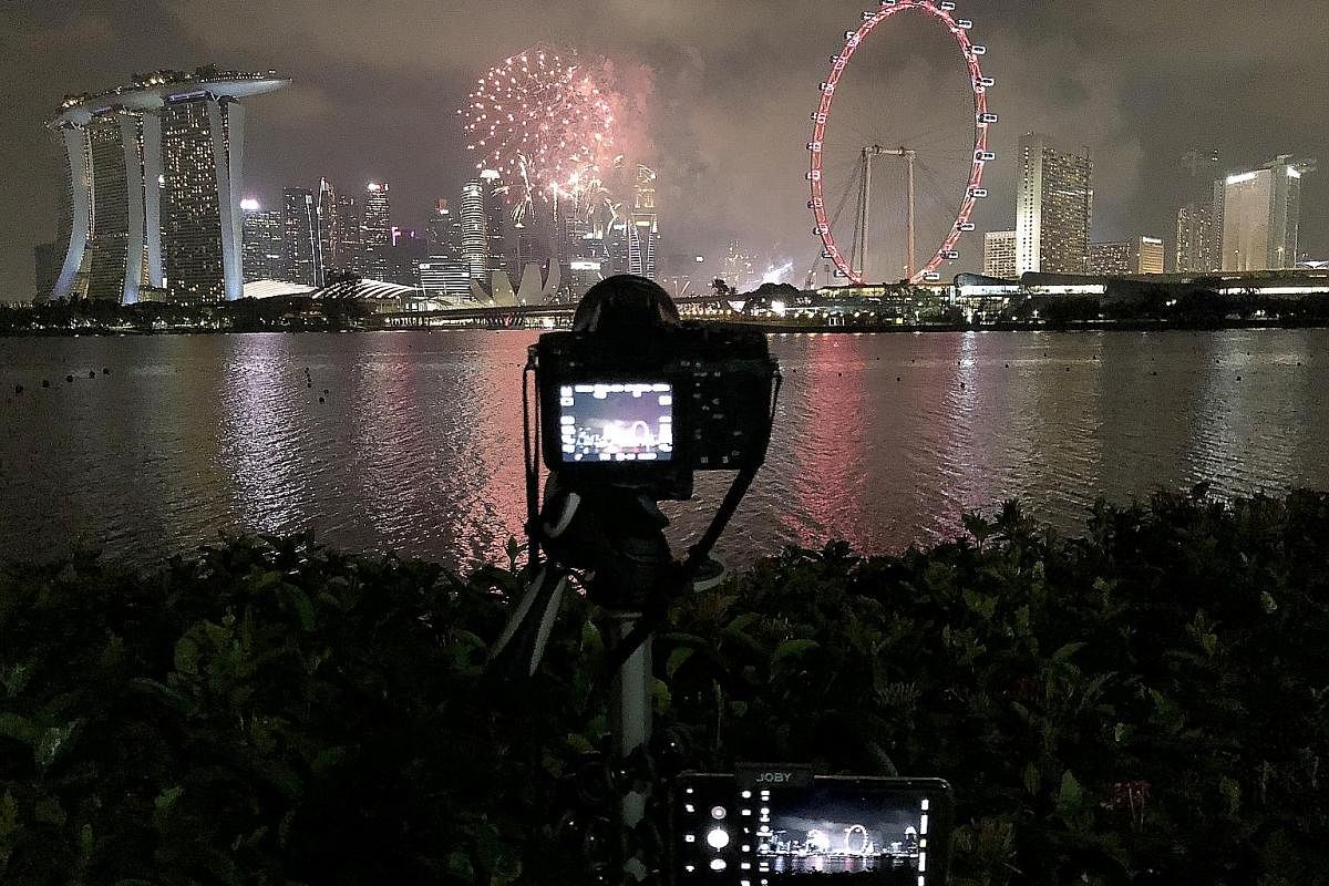 The writer's set-up of a mirrorless camera and a smartphone to capture the National Day Parade fireworks at Gardens by the Bay East.