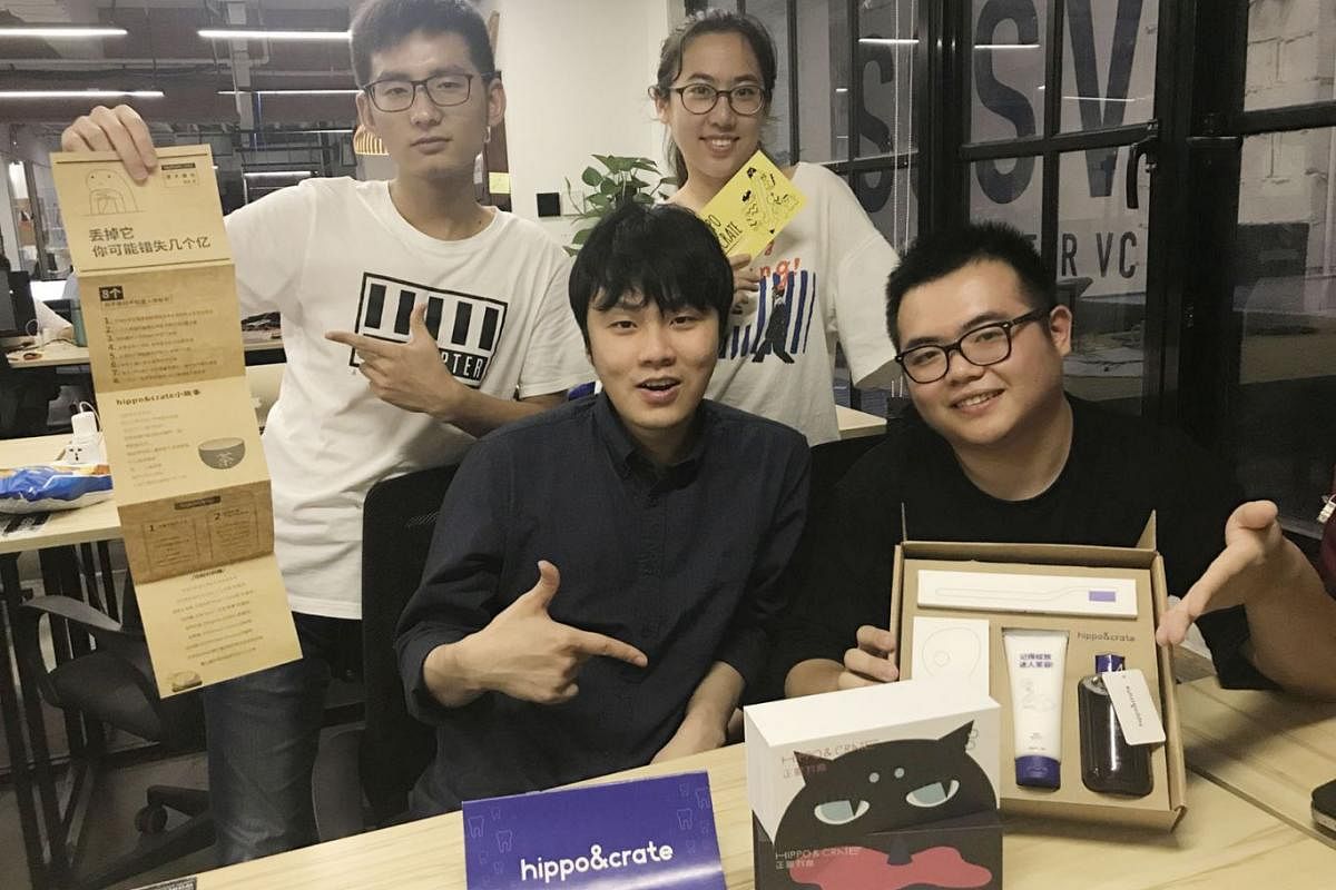 Mr Cornelius Sutrisno (front, left) with the team at his start-up, which sells dental products. He moved his business from Shenzhen to Shanghai, citing a mature ecosystem for start-ups there.