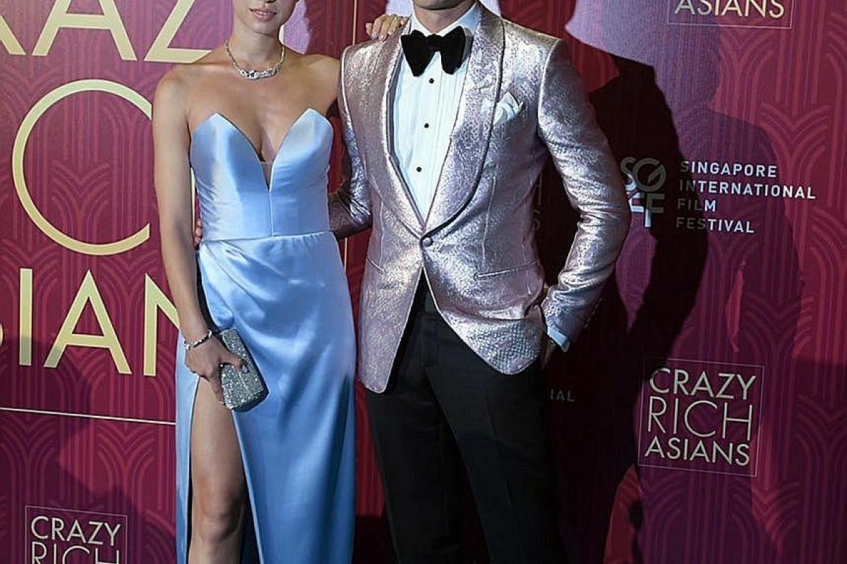 Henry Golding and his wife, Liv Lo, at the film premiere of Crazy Rich Asians in Singapore last month.