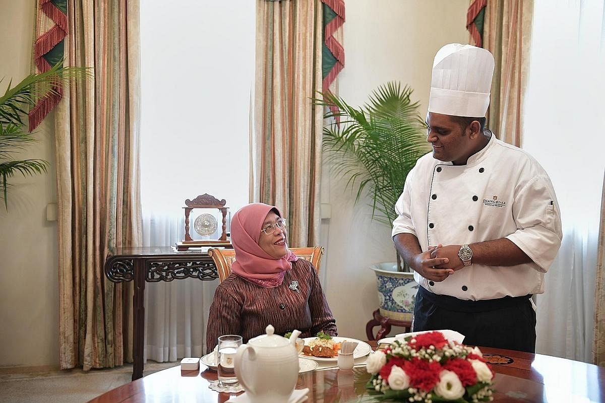 President Halimah with Mr Paul Simon before tucking into a meal prepared by him at the Istana on Jan 24. She reached out to him after reading a report in The Straits Times about his wish to cook for her. Mr Simon, who works at a hotel and has mild in