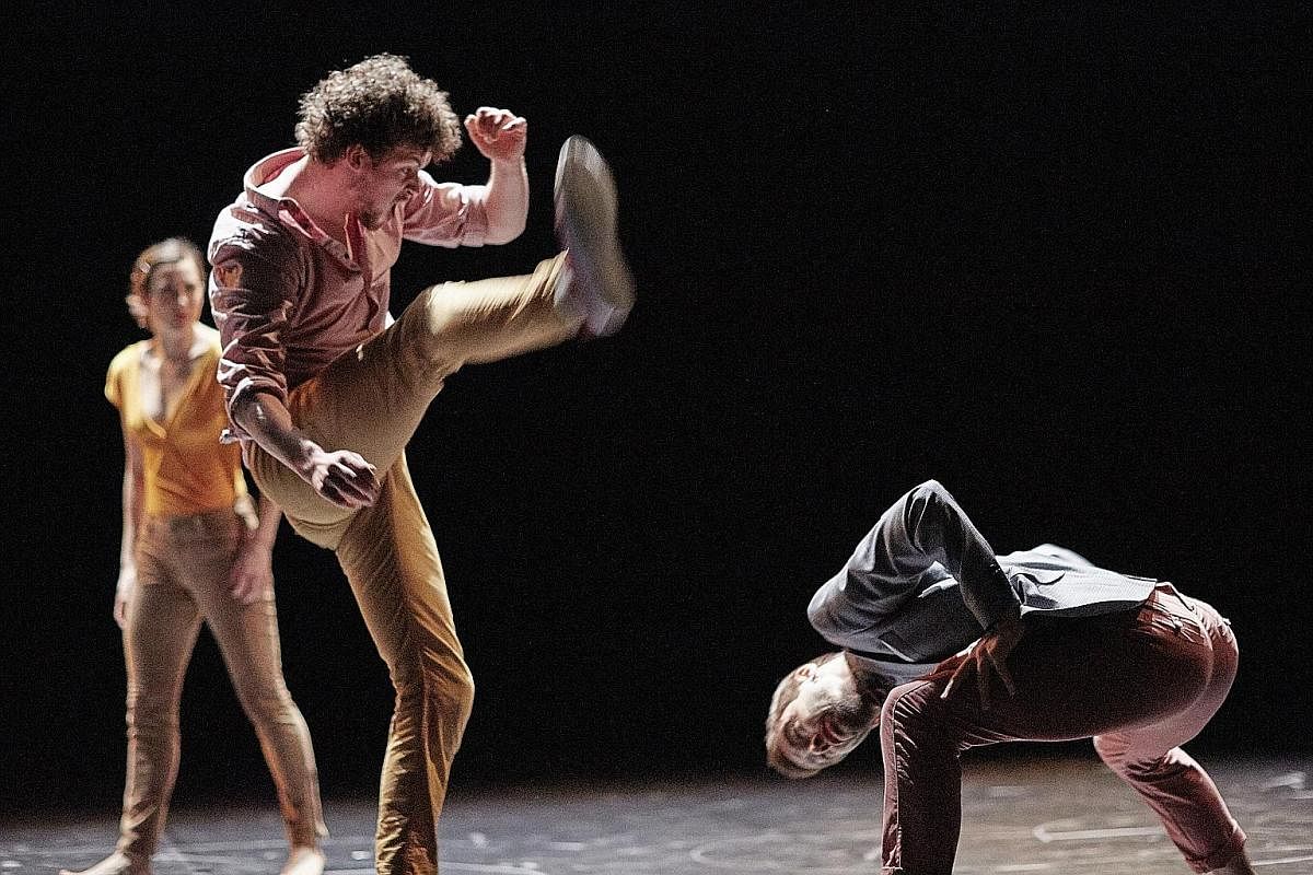 The "violence" in dance performance Joy (left) is achieved by the careful angling of bodies, the exaggerated expressions of pain and sound effects from the sidelines.