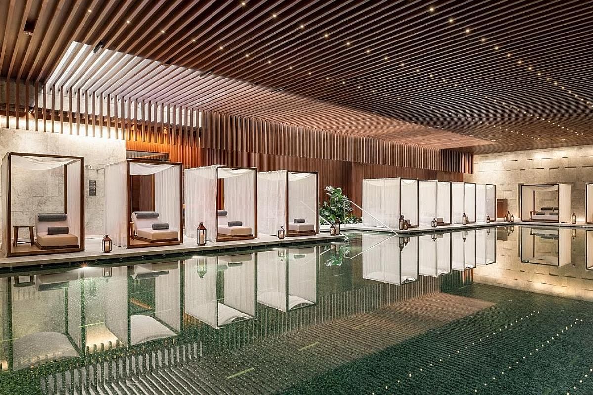 The pool at Bvlgari Hotel Shanghai. The hotel, which opened in June, is a restored Chamber of Commerce building in Shanghai built in 1916. The hipster Tianzifang shopping area is where to find shikumen, or preserved heritage alley lane houses. An art