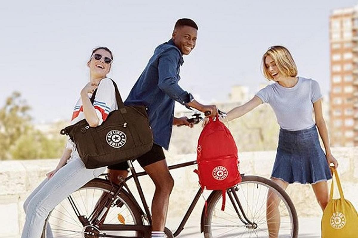 New Kipling designs in simpler silhouettes with the new logo.