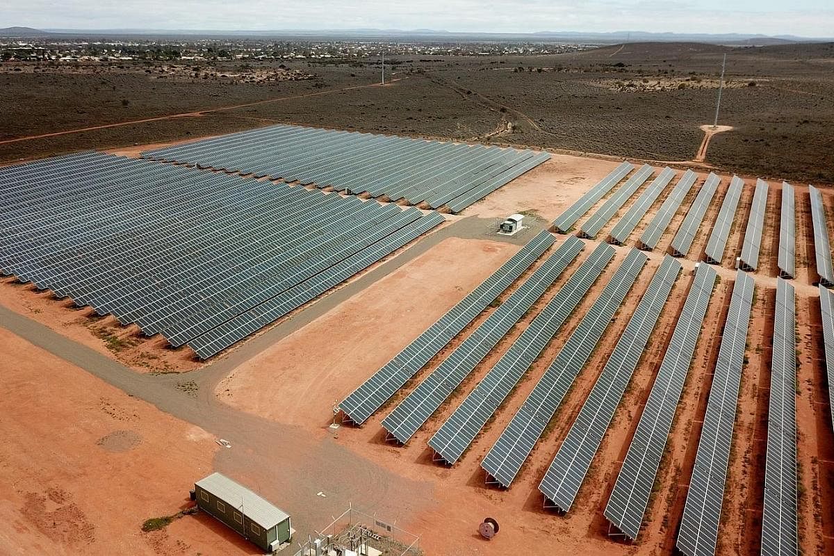 Far left: Solar panels for the Whyalla solar plant project in South Australia, where there has been a push for renewable energy. In the September quarter, Australia deployed 1.5GW of solar energy, hitting 10.1GW in total installed solar capacity nati