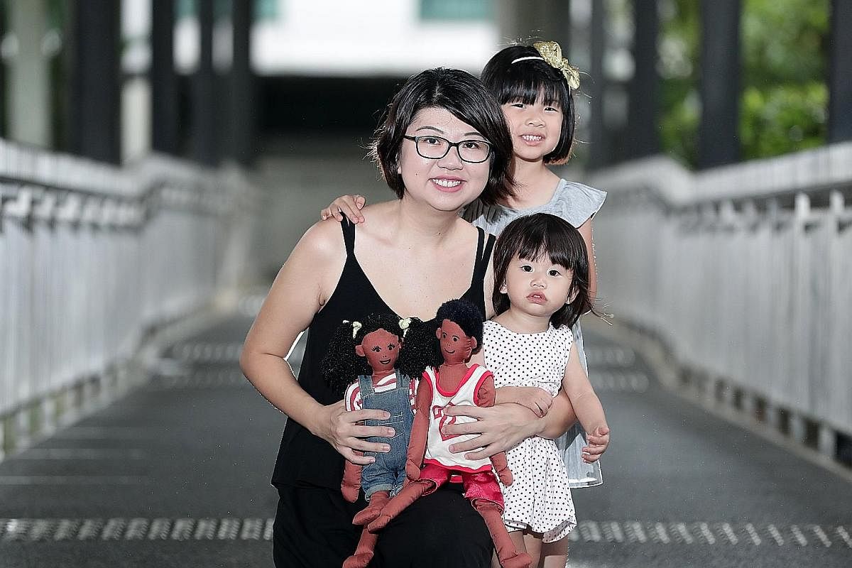 Freelance producer Mervyn Lim gave his son Alexander Lim a book, Karung Guni Boy. Freelance writer Jinny Koh (with daughters Ariel and Esther) says the best gifts she got were these two dolls from her former domestic helper. Ms Ruby Lim-Yang's son sa