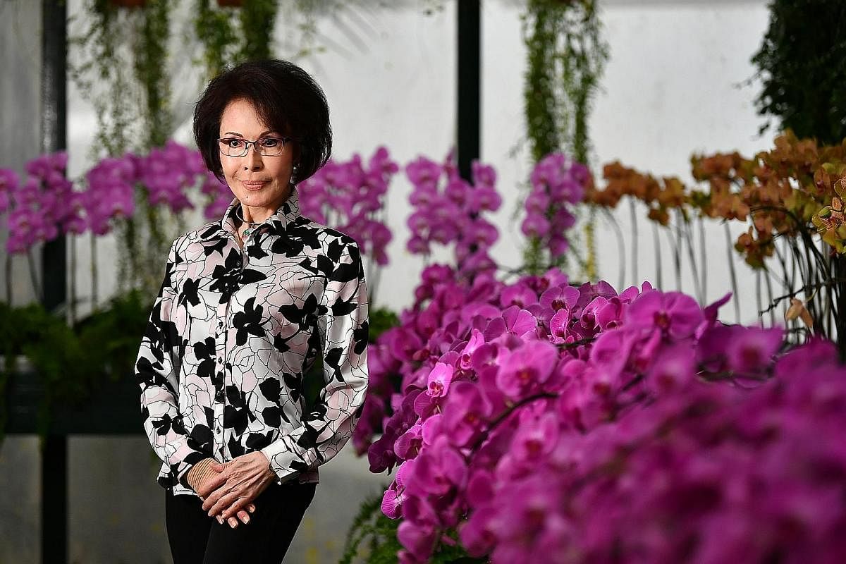 Top: Ms See Biew Wah in the SIA sarong kebaya in the 1970s. She modelled for renowned French couturier Pierre Balmain, who designed it. Above: Now 73 and retired, Ms See lives in Kuala Lumpur with her husband, a former SIA station manager. The iconic