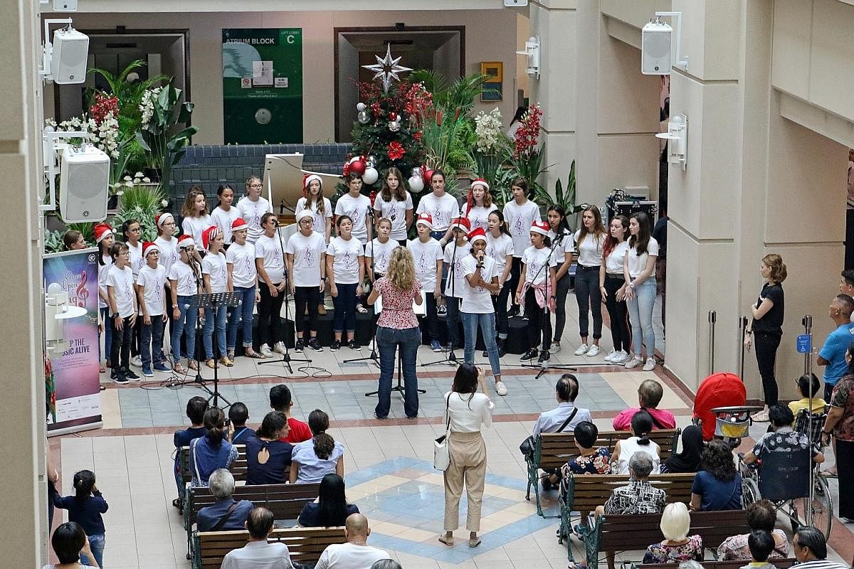 A concert organised by Sing'theatre at the lobby of Tan Tock Seng Hospital.