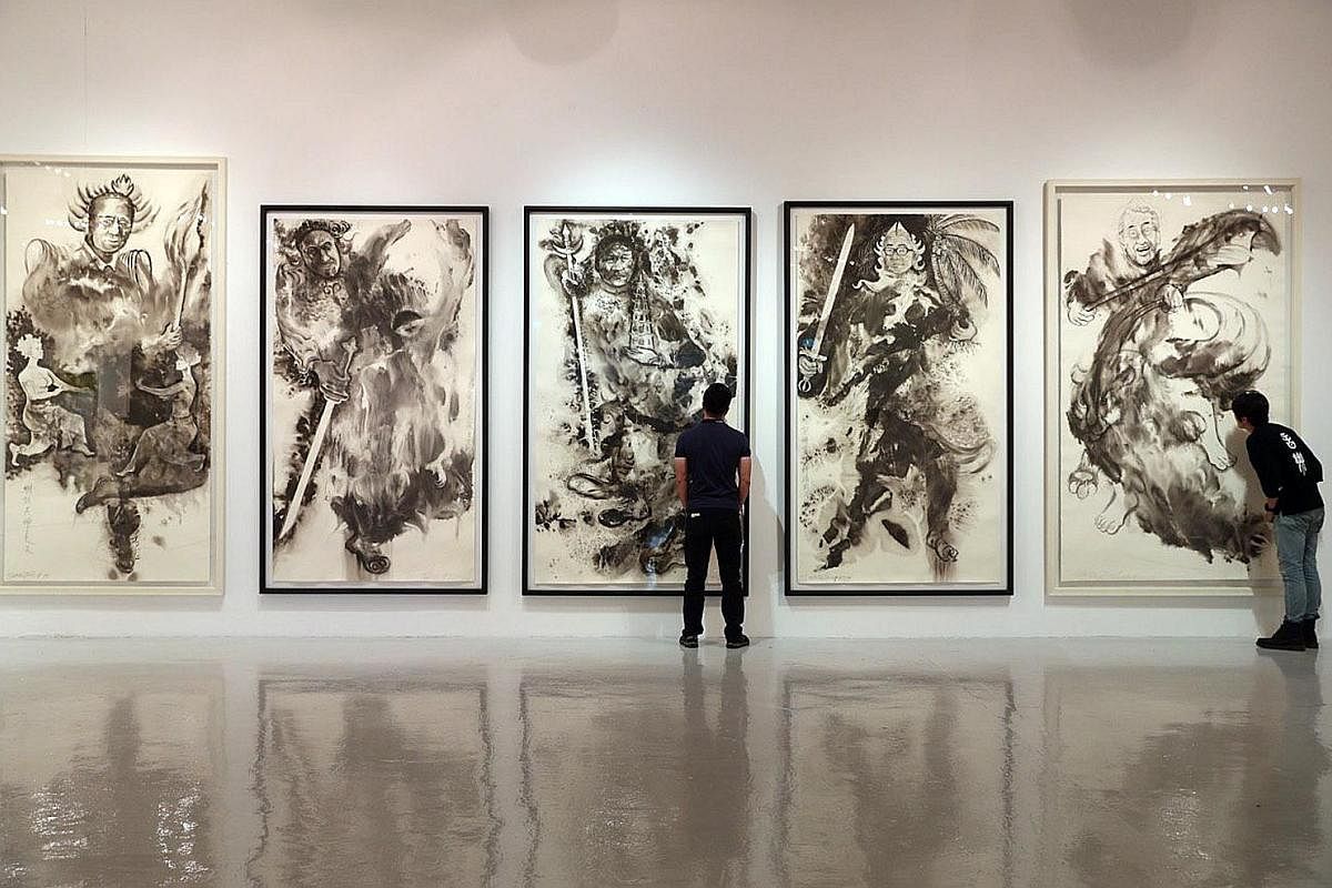 Exhibitions taking place during the ongoing Singapore Art Week include Artcommune's latest show at Artspace@ Helutrans, featuring Singapore artist Tang Da Wu's larger-than-life Chinese ink paintings (above) and artist Andre Wee's Within Without: A So